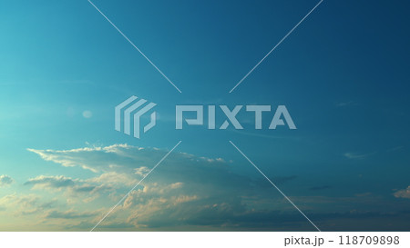 Spring Day With A Clear Blue Sky And Fluffy White Clouds. Day With Warm Sunshine Combined With Cool Breeze. Spring Day With A Clear Blue Sky And Fluffy White Clouds. Day With Warm Sunshine Combined With Cool Breeze. 118709898
