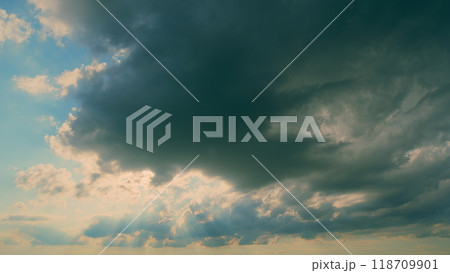 Dark Gray Clouds In Sky Of Rainy Season. Enlightenment Concept. Rain Is Coming. Beautiful Storm Clouds. Dark Gray Clouds In Sky Of Rainy Season. Enlightenment Concept. Rain Is Coming. Beautiful Storm Clouds. 118709901