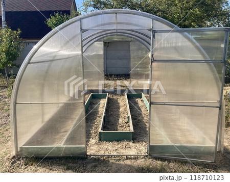 Installing wooden beds in a greenhouse Installing wooden beds in a greenhouse 118710123