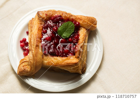 Cranberry dessert on a light color 118710757