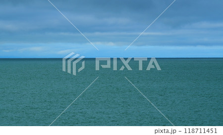 Stormy And Cloudy Sky Over Dark Sea. Ocean On An Overcast Day. Global Warming Concept. Still. 118711451