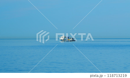 Fishing Ship Trawler At Day In The Sea. Ship Sailing Close Up Fishing Boat. Still. Fishing Ship Trawler At Day In The Sea. Ship Sailing Close Up Fishing Boat. Still. 118713219