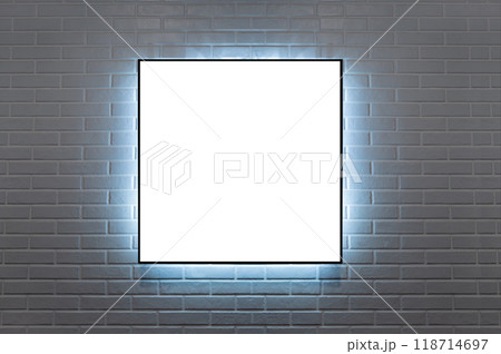 frame hanging on a brick wall illuminated wit LED light frame hanging on a brick wall illuminated wit LED light 118714697