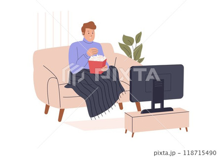 Man relaxing watching a movie on the sofa 118715490