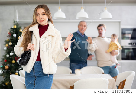 Men quarreling with girl 118717906