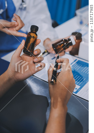 international team of professional doctors having a meeting in conference room at the modern hospital. Healthcare and medical development concept. international team of professional doctors having a meeting in conference room at the modern hospital. Healthcare and medical development concept. 118717985