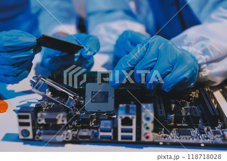 Electronics technician, electronic engineering electronic repair, electronics measuring and testing, repair and maintenance concepts. Electronics technician, electronic engineering electronic repair, electronics measuring and testing, repair and maintenance concepts. 118718028