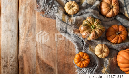 Many different colorful pumpkins on wooden background. Top view. Halloween and harvest concept. 118718124