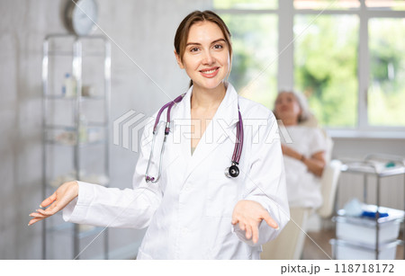 Young doctor with stethoscope 118718172