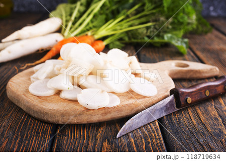White radish on wooden board White radish on wooden board 118719634