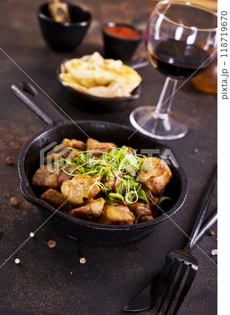 Fried meat with herb and spices. 118719670