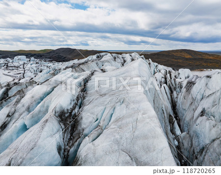 Aerial beautiful spring day view of Svinafellsjokull Glacier, Iceland. Skaftafell glacier, Vatnajokull National Park in Iceland. 118720265