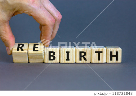 Birth or rebirth symbol. Businessman turns wooden cubes and changes the word birth to rebirth. Beautiful grey table grey background, copy space. Business, birth or rebirth concept. Birth or rebirth symbol. Businessman turns wooden cubes and changes the word birth to rebirth. Beautiful grey table grey background, copy space. Business, birth or rebirth concept. 118721848