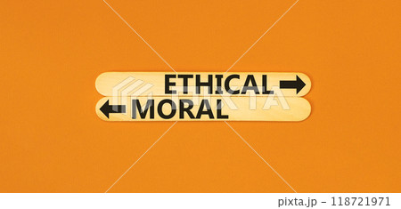 Ethical or moral symbol. Concept word Ethical or Moral on beautiful wooden stick. Beautiful orange table orange background. Business and ethical or moral concept. Copy space. 118721971
