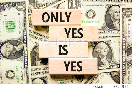 Only yes is yes symbol. Concept words Only yes is yes on wooden blocks on a beautiful background from dollar bills. Business, psychological only yes is yes concept. Only yes is yes symbol. Concept words Only yes is yes on wooden blocks on a beautiful background from dollar bills. Business, psychological only yes is yes concept. 118721976