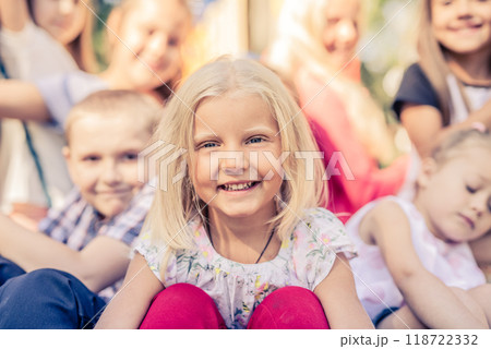 Smiling Little Kids sitting together 118722332