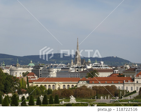 View of the gardens from the Upper Belvedere with the roof of St. Stephen's Cathedral (Stephansdom) in the distance, Vienna. 118722516