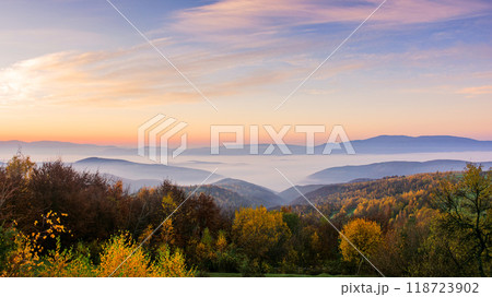 mountainous rural landscape in autumn at sunrise. fog in the valley. carpathian scenery countryside in morning light mountainous rural landscape in autumn at sunrise. fog in the valley. carpathian scenery countryside in morning light 118723902