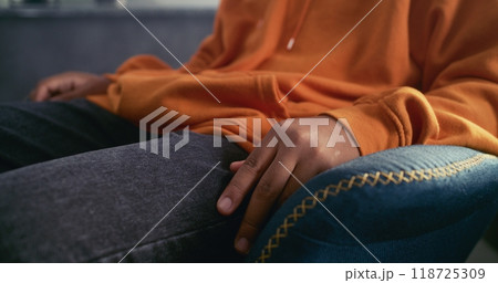 Close up of African American teenage boy gesturing during communication with psychologist 118725309