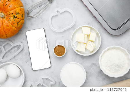 Ingredients for baking cookies for Halloween, smartphone mock-up. Seasonal autumn baking 118727943