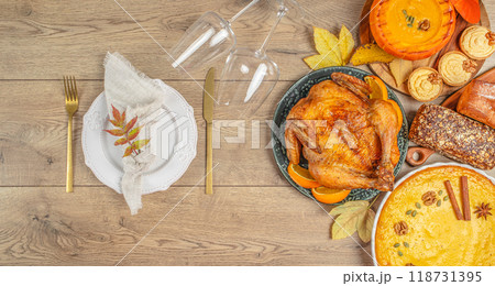 Thanksgiving day celebration dinner setting with traditional meal, top view. copy space for text 118731395