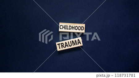 Childhood trauma symbol. Concept words Childhood trauma on beautiful wooden blocks. Beautiful black table black background. Business psychology childhood trauma concept. Copy space. Childhood trauma symbol. Concept words Childhood trauma on beautiful wooden blocks. Beautiful black table black background. Business psychology childhood trauma concept. Copy space. 118731781