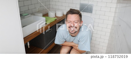 Man feeling relief after using toilet, fulfill natural need 118732019