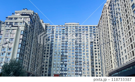 Large multi-storey residential building. Panorama. Urban architecture. 118733387