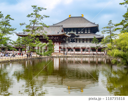 Nara Park with pond and deers, in Nara, Japan Nara Park with pond and deers, in Nara, Japan 118735818
