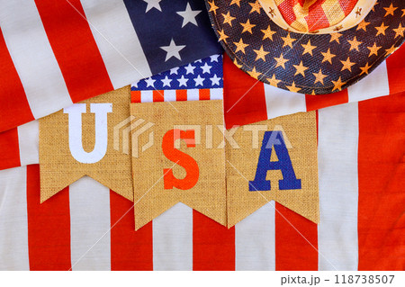 An American flag holiday banner with inscription USA is part of symbols of America 118738507