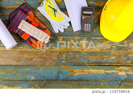 Rustic wooden background with safety gear celebrates Labor Day at United States of America Rustic wooden background with safety gear celebrates Labor Day at United States of America 118739658