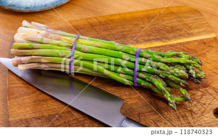 Raw asparagus for making delicious healthy lunch. Healthy eating concept Raw asparagus for making delicious healthy lunch. Healthy eating concept 118740323