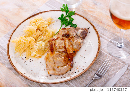 Fried pork served with marinated cabbage Fried pork served with marinated cabbage 118740327