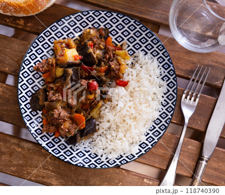Stewed eggplants with minced meat and white rice closeup Stewed eggplants with minced meat and white rice closeup 118740390