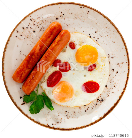 Breakfast with scrambled eggs, sausage and tomatoes 118740616