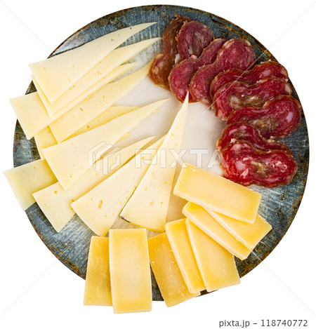 Snack plate - slicing several varieties of cheese, smoked sausage butifarra Snack plate - slicing several varieties of cheese, smoked sausage butifarra 118740772