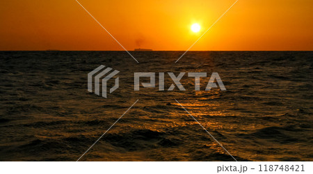 Red sunset over the Red Sea off the coast of Egypt Red sunset over the Red Sea off the coast of Egypt 118748421