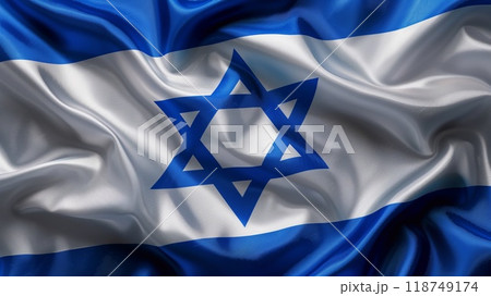 Waves of blue and white fabric display the Israeli flag, emphasizing cultural pride and national identity against a clear backdrop 118749174