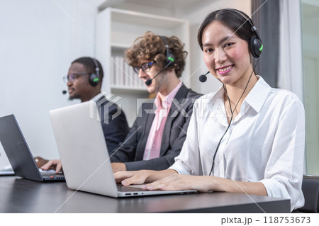 Team multiethnic call center worker and operators with headset and computer Team multiethnic call center worker and operators with headset and computer 118753673