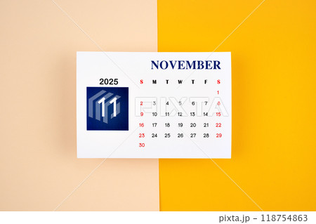 November Calendar 2025 page on yellow background. November Calendar 2025 page on yellow background. 118754863