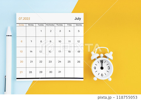 July 2025 Monthly calendar for 2025 year with pen on yellow and blue background. 118755053