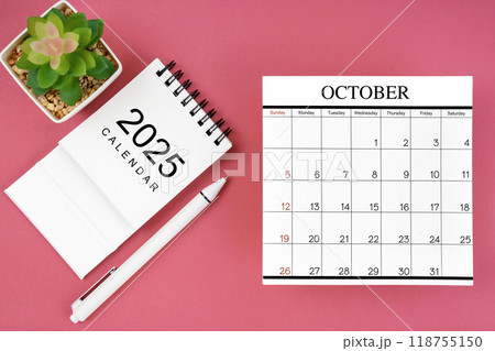 White calendar for October 2025 and pen on pink background, planning concept. White calendar for October 2025 and pen on pink background, planning concept. 118755150
