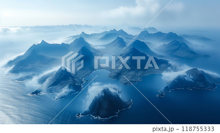 Majestic Aerial View of Mist-Covered Mountain Peaks and Serene Ocean Waters in a Remote Landscape 118755333