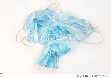 used latex gloves, medical protective masks and shoe covers. The problem of ecology 118755455