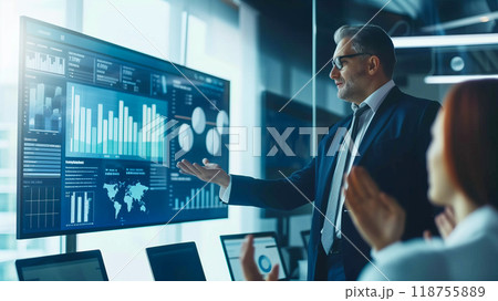 Business Professional Presents Data Analysis in a Modern Conference Room During a Meeting 118755889