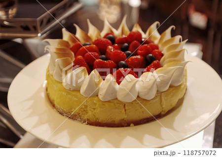 Beautiful multicolored decorated baked sweet tasty party cakes or catering cakes for party, bar dessert selection with cake, pie and pastries catering banquet, coffee break buffet at a conference Beautiful multicolored decorated baked sweet tasty party cakes or catering cakes for party, bar dessert selection with cake, pie and pastries catering banquet, coffee break buffet at a conference 118757072