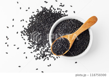 Black sesame seeds in white bowl with wooden spoon isolated on white background Black sesame seeds in white bowl with wooden spoon isolated on white background 118758300