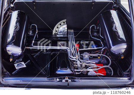 15.09.2024. Novosibirsk, Midday, Open car trunk with installation receiver, compressor for pneumatic cylinder. For wall projects, tuning machines, close up photo 118760246