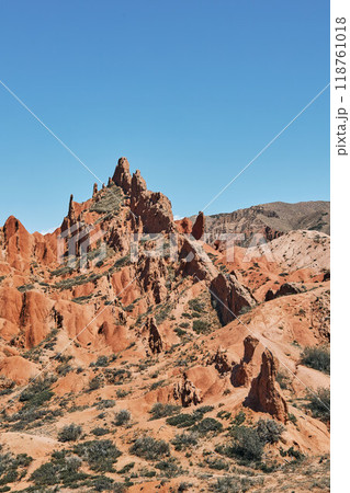 Picturesque Skazka canyon on the southern shore of Issyk-Kul lake, Kyrgyzstan Picturesque Skazka canyon on the southern shore of Issyk-Kul lake, Kyrgyzstan 118761018