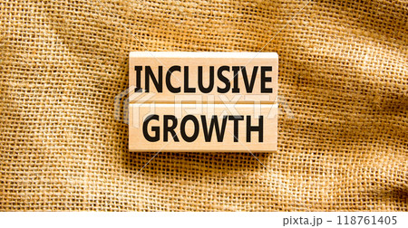 Inclusive growth symbol. Concept words Inclusive growth on beautiful wooden blocks. Beautiful canvas table canvas background. Business inclusive growth concept. Copy space. 118761405